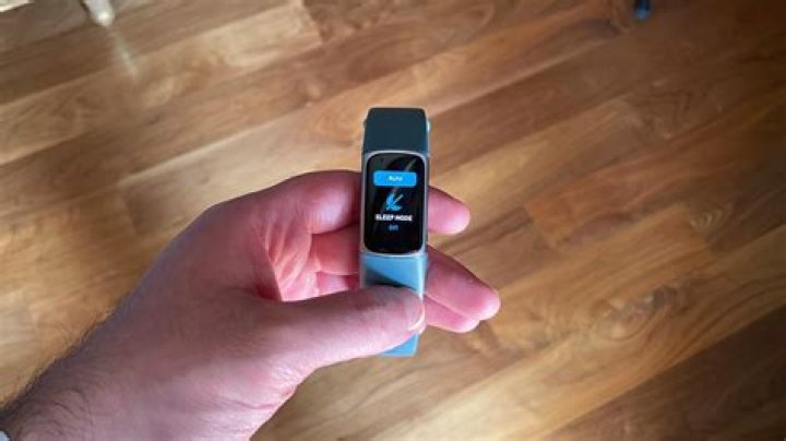 How do you activate sleep mode on Fitbit Flex?